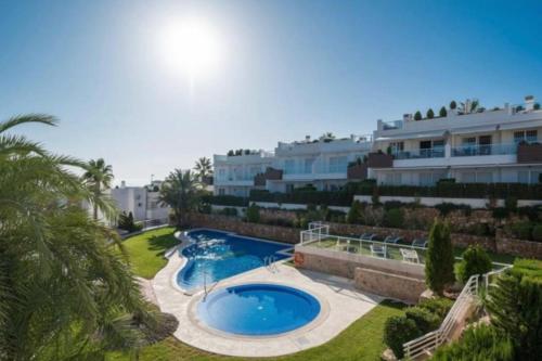 an image of a swimming pool in a resort at Nova Beach Penthouse in Gran Alacant
