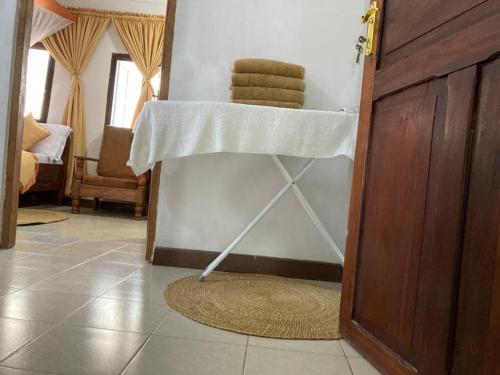 Кровать или кровати в номере Usangi House