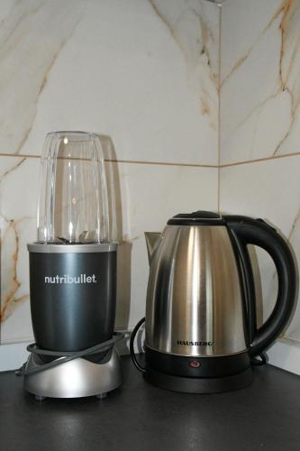 Apartman Pčelica Somborにあるコーヒーまたはお茶
