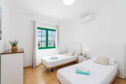 A bed or beds in a room at Villa Sargo