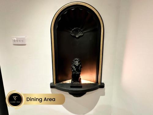 a clock in a display case in a museum at Luxury 4 Bed Room House, Heathrow in Colnbrook