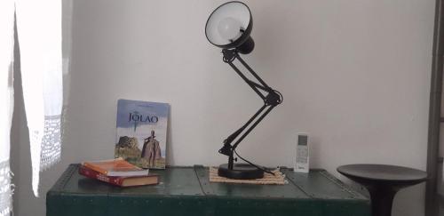 a desk with a mirror on top of a table at Relax in Cea - Tortolì in Bari Sardo