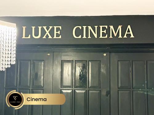 a sign on the front of a building at Luxury 4 Bed Room House, Heathrow in Colnbrook