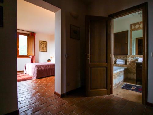 Katil atau katil-katil dalam bilik di Agriturismo Boschi di Montecalvi