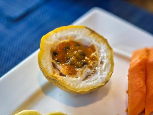 a piece of food on a white plate at Villa Alizee in Port Louis