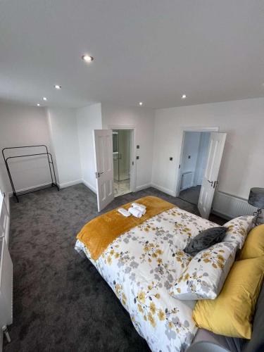 a bedroom with a large bed in a room at The Earls in Newry