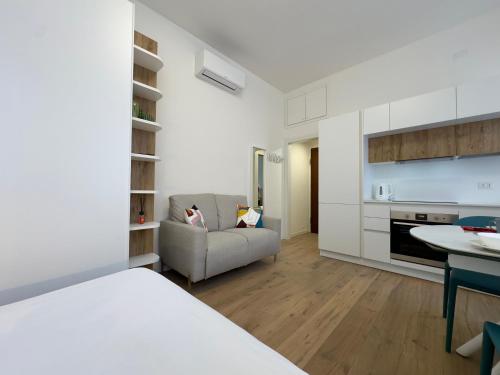 Postel nebo postele na pokoji v ubytování Navigli Modern Stay