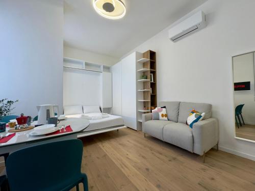 Postel nebo postele na pokoji v ubytování Navigli Modern Stay