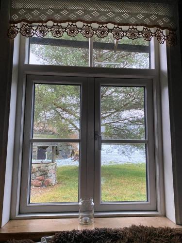 a window with a view of a yard at Farmhouseinn1923 