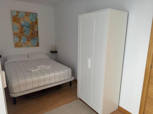 Postel nebo postele na pokoji v ubytování Apartamento y ático en Tomares, Sevilla