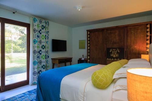 Katil atau katil-katil dalam bilik di Campo Bahia Hotel Villas Spa