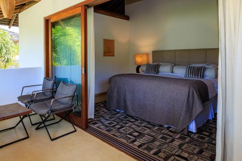 Katil atau katil-katil dalam bilik di Campo Bahia Hotel Villas Spa