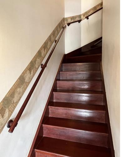 a set of stairs in a house at Quatre Saisons Residence in Campos do Jordão