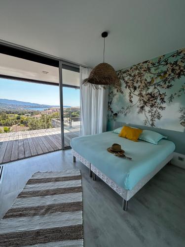 Postel nebo postele na pokoji v ubytování Villa Scappà Porticcio