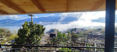 a view of a mountain from a balcony with a view at Guest house Loloçi in Gjirokastër