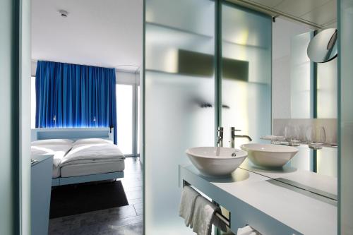 Postel nebo postele na pokoji v ubytování Hotel Cristal Design
