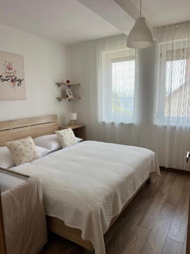 Ένα ή περισσότερα κρεβάτια σε δωμάτιο στο Sunny Apartment Bojnice
