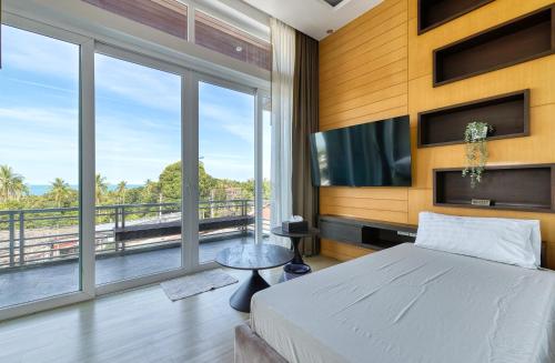 Postel nebo postele na pokoji v ubytování Surisa Seaview Pool Villas