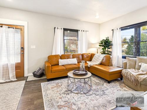 a living room with a couch and a table at Historical Albany Downtown House with 5 Bedrooms in Albany