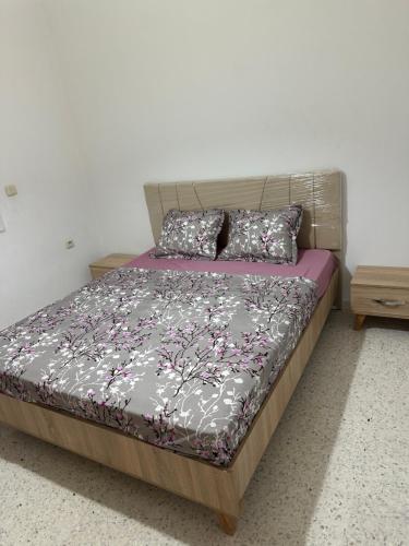 Postel nebo postele na pokoji v ubytování Résidence Zohra
