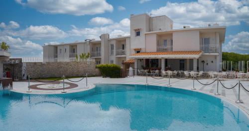 a large swimming pool in front of a building at Hotel le Rocce - Agerola, Amalfi Coast in Agerola