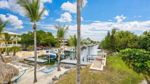 a view of a river with palm trees at Port Largo Villas Escape 5A in Key Largo