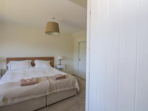Una cama o camas en una habitación de Sobrachan