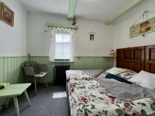 Postel nebo postele na pokoji v ubytování U Efy