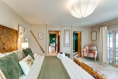 a living room with a couch and a chair at Waterfront Escape on Blue Ridge Lake with Dock! in Morganton