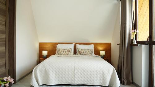 Postel nebo postele na pokoji v ubytování OISHE Boutique Hotel