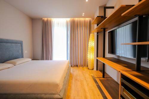 Un ou plusieurs lits dans un hébergement de l'établissement SanPietro Vacation Rentals