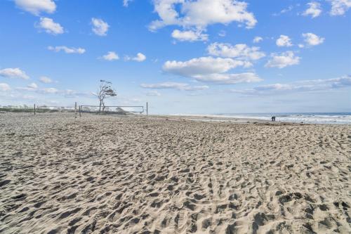 a sandy beach with a soccer ball and a goal at 4980 Sandyland Road #216 in Carpinteria