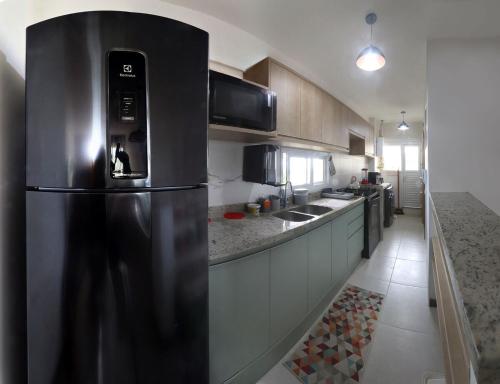 Dapur atau dapur kecil di Apto 3 quartos Baixio - Ponta de Inhambupe