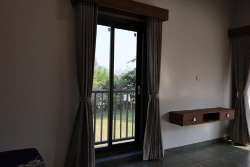 Villa 57 Abhishree Orchardsにあるベッド