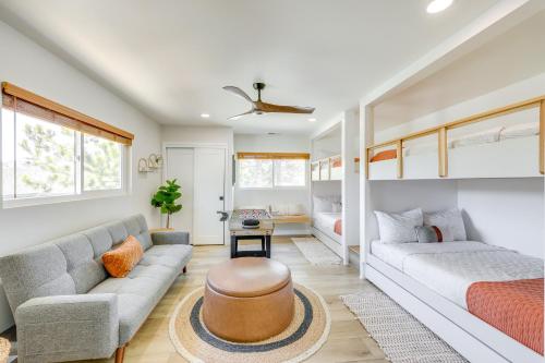 a living room with a couch and a bed at Walk to The Village ShopsandEats Big Bear Lake Home in Big Bear Lake