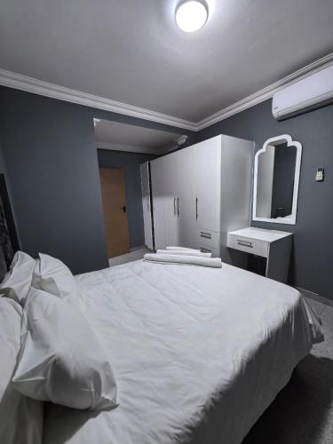 Katil atau katil-katil dalam bilik di Selina Guesthouse