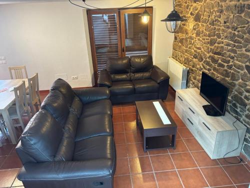TV a/nebo společenská místnost v ubytování Casa de Outes