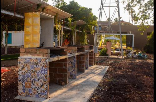 a house being constructed with mosaics on it at Iglú Gulliver a 6 minutos de la playa en auto in Barra de Navidad