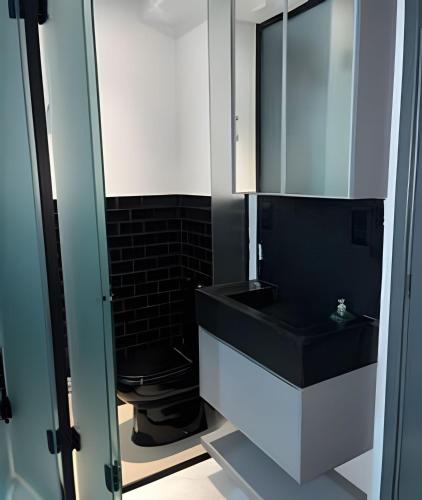 Un baño de Flat a 50 metros da praia + piscina e área gourmet