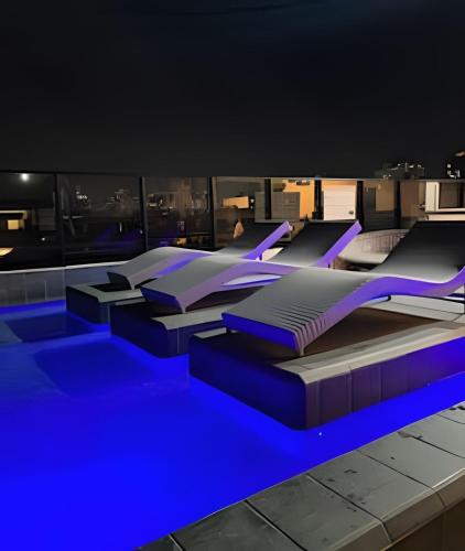 La alberca dentro o cerca de Flat a 50 metros da praia + piscina e área gourmet