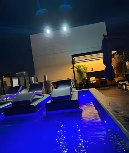 La alberca dentro o cerca de Flat a 50 metros da praia + piscina e área gourmet
