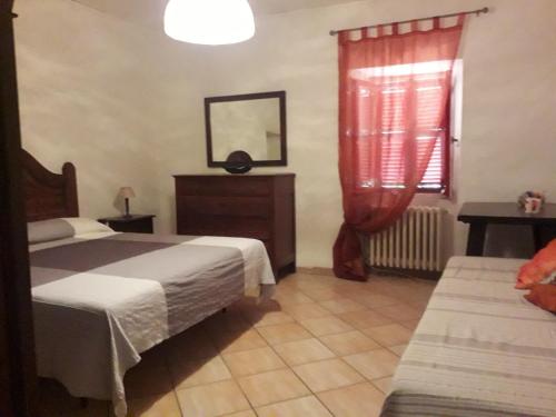 Postel nebo postele na pokoji v ubytování Tuscia Viterbese Casale Nel Verde