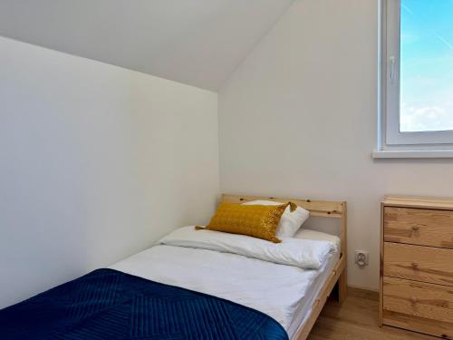 Ένα ή περισσότερα κρεβάτια σε δωμάτιο στο LOFT Apartments