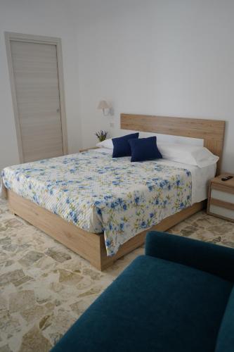 Ένα ή περισσότερα κρεβάτια σε δωμάτιο στο B&B Santa Filomena