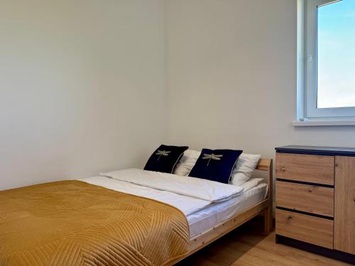 Ένα ή περισσότερα κρεβάτια σε δωμάτιο στο LOFT Apartments