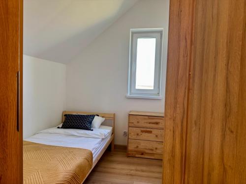 Ένα ή περισσότερα κρεβάτια σε δωμάτιο στο LOFT Apartments