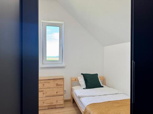 Ένα ή περισσότερα κρεβάτια σε δωμάτιο στο LOFT Apartments