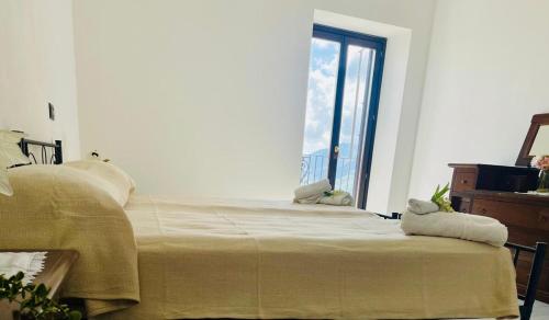 Cama o camas de una habitación en A Posticastello