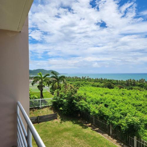 a balcony with a view of the ocean at Sunrise in Villas del Faro in Emajagua