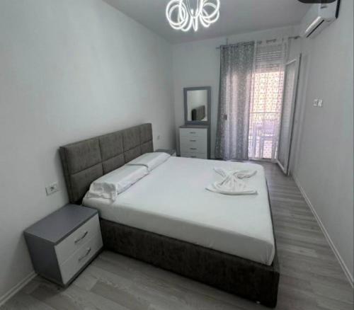 Katil atau katil-katil dalam bilik di Alex Holiday Apartment